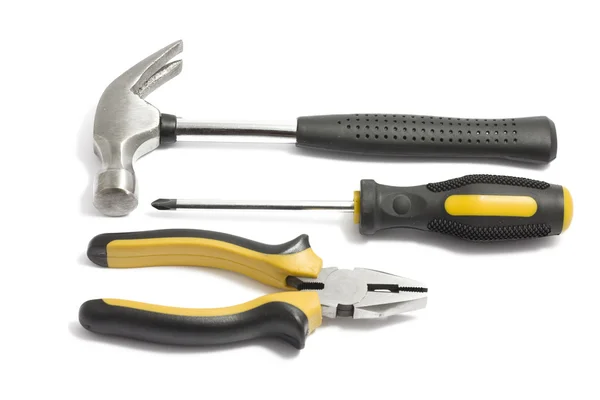 Screwdriver, pliers and hammer — Stock Photo, Image