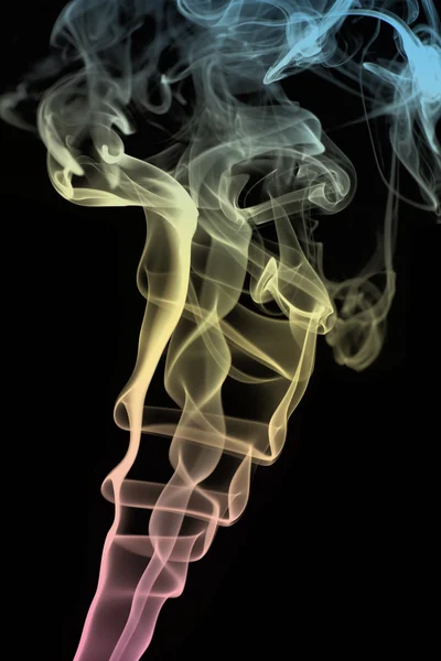 Έγχρωμος καπνός σε μαύρο φόντο — Φωτογραφία Αρχείου