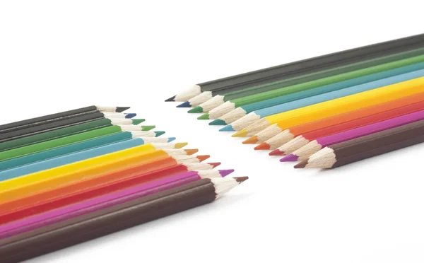 Wooden pencils of different colors on a white background — Stock Photo, Image