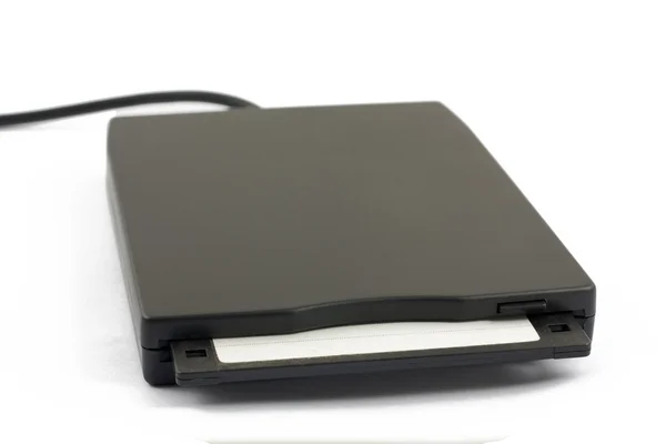 Unidade de disquete USB com disco no fundo branco — Fotografia de Stock