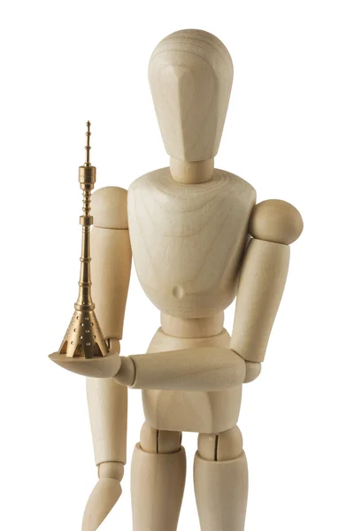 Wooden mannequin with Ostankino tower model — Stock Photo, Image
