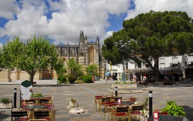 Cathedral and Cafe on the square clipart