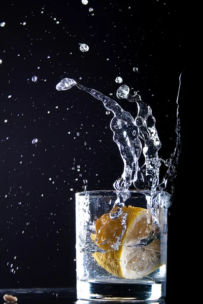 Stock image Lemon and water