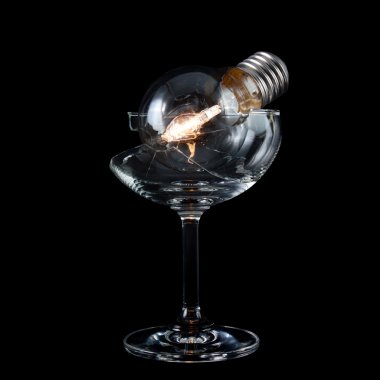 Cracked wine glass and light bulb clipart