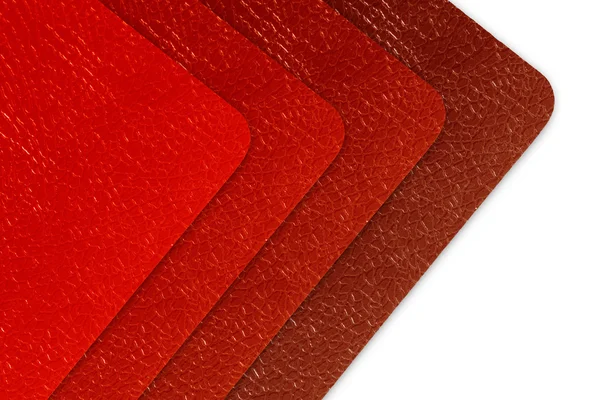 Колекція червоних шкіряних тонів ізольована на білому Стокове Фото