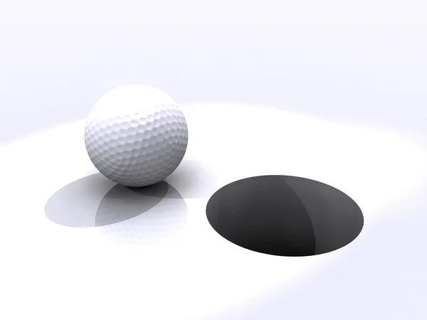 Bola de golfe e buraco — Fotografia de Stock
