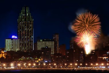 Fireworks over the city clipart