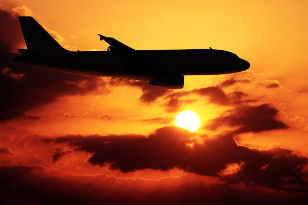 Airplane in a sunset