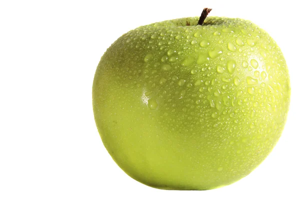 Zelené jablko s kapkami vody — Stock fotografie