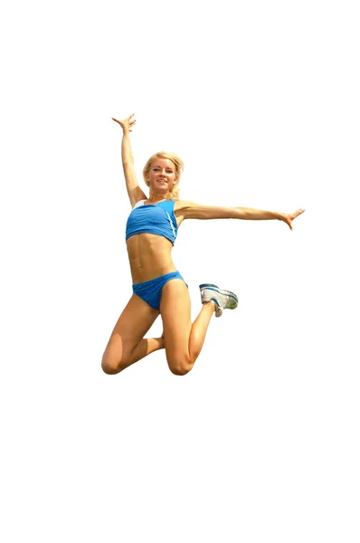 Die Sportlerin in einem Sprung — Stockfoto