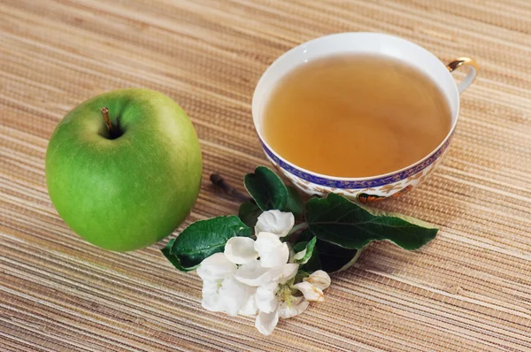 Still-life with green tea and an apple — Stock Photo, Image