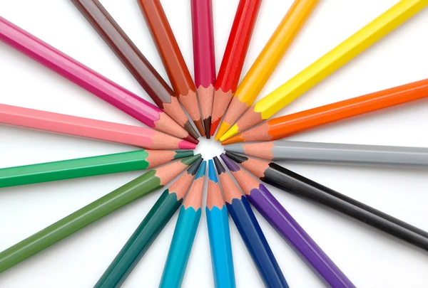 Regenboog potloden gecentreerd — Stockfoto