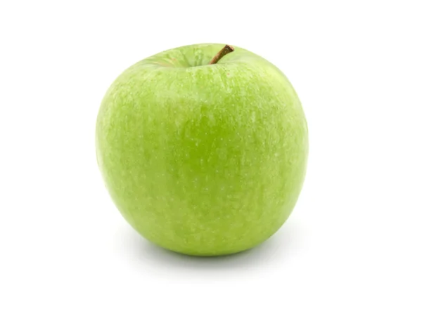 Zelené jablko na bílém pozadí — Stock fotografie