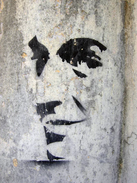 Buenos Aires, Argentina, Março de 2010, Face grafitti na parede Imagem De Stock