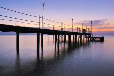 Pier siluet sunrise ışıltı içinde