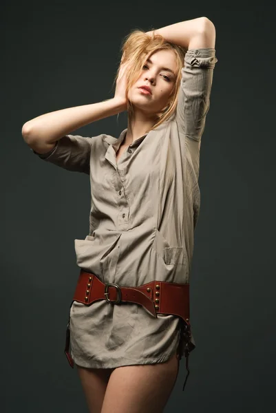 Seductive fashion portrait of young woman on dark background — Stock Photo, Image