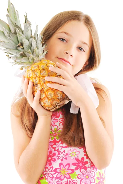 Lille pige med en ananas - Stock-foto