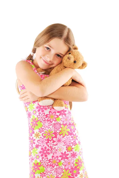 Kleines Mädchen nimmt Teddybär — Stockfoto