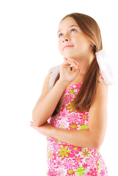 Little girl with bows thinking — Stock Photo, Image