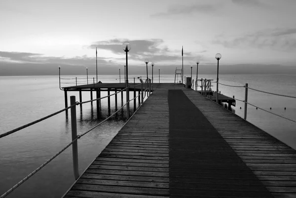 Black and white morning pier — Stock Photo, Image