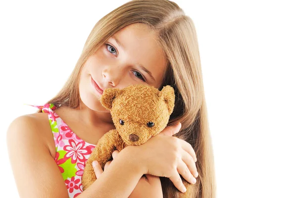 Weinig meisje knuffelen bear speelgoed — Stockfoto