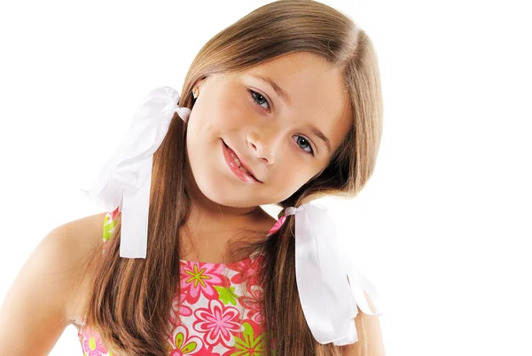 Bright portrait of little girl with white bows — Stock Photo, Image