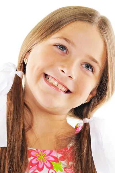 Světlé portrét holčička s bílými mašlemi — Stock fotografie