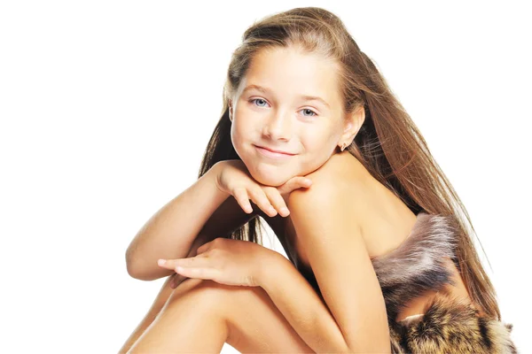 Girl in the fur as a prehistoric — Stock Photo, Image