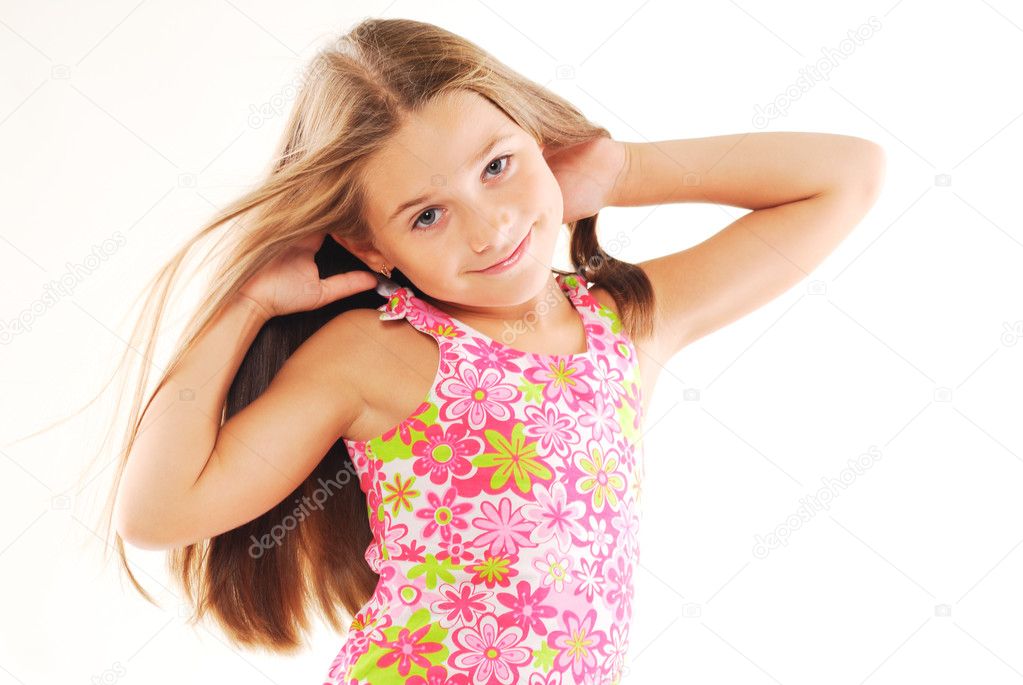 Little blond girl playing with her hair Stock Photo by ©photolux 3765040