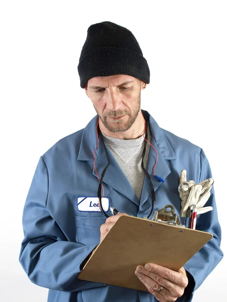 Mężczyzna robotnik pisanie notatek — Zdjęcie stockowe