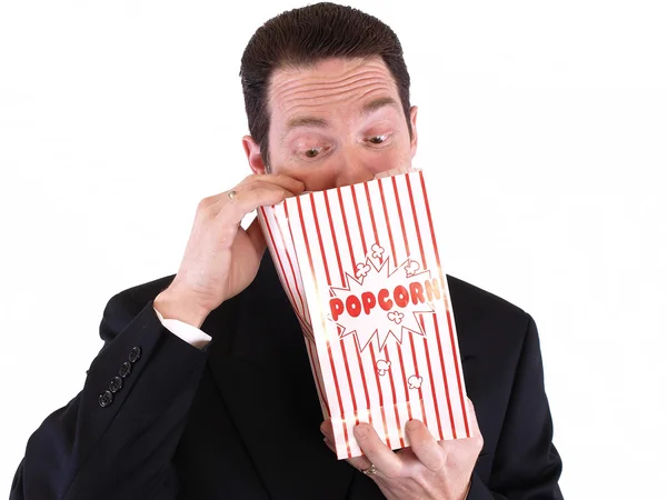 Op zoek naar popcorn Rechtenvrije Stockfoto's