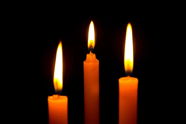 Три свечи — стоковое фото