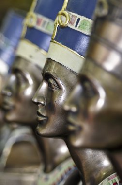 The busts of Nefertiti in the Egyptian souvenir shop clipart