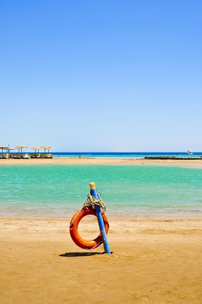 Life buoy on the beach of Egypt — Stock Photo, Image