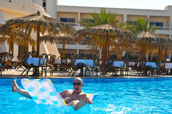 stock image The Russian guy madly dives into pool