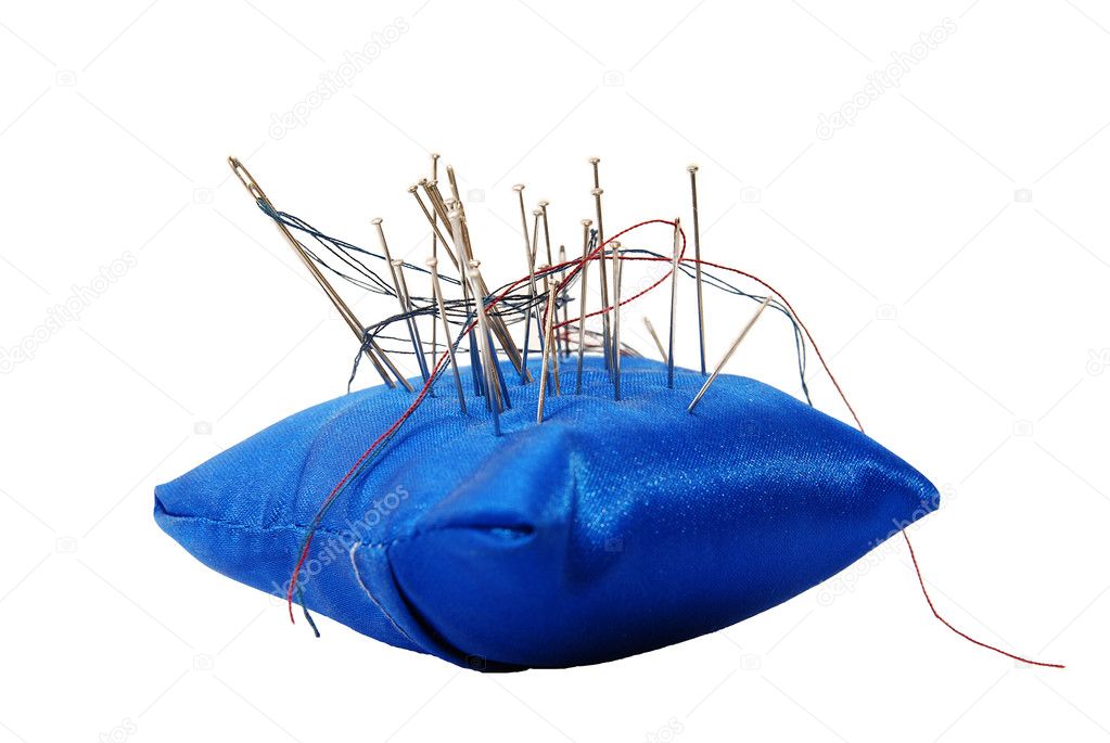 Pincushion with needles and threads