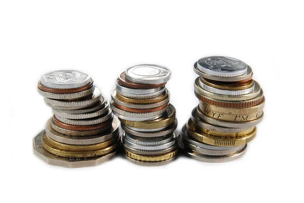 Tři zásobníky různých mincí — Stock fotografie