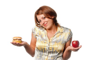 Kız, elma ve hamburger arasında seçilir.