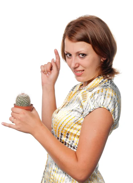 Girl touches a cactus — Stock Photo, Image