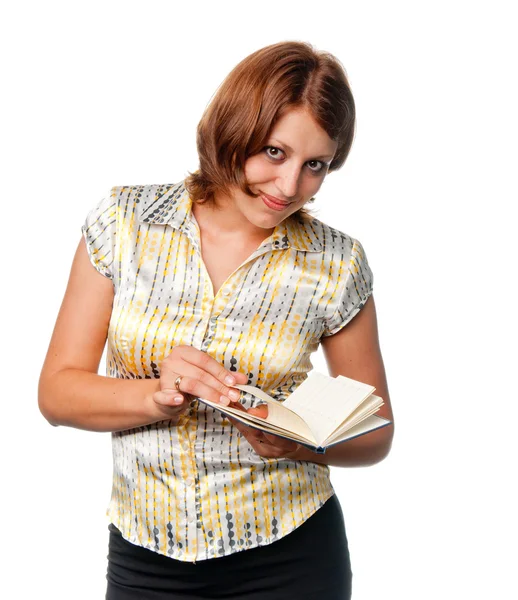 stock image Smiling girl reads the datebook