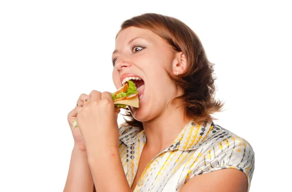 Menina com muita fome e sanduíche — Fotografia de Stock
