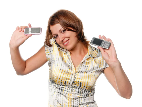 Girl talks at once by three mobile phones — Stock Photo, Image