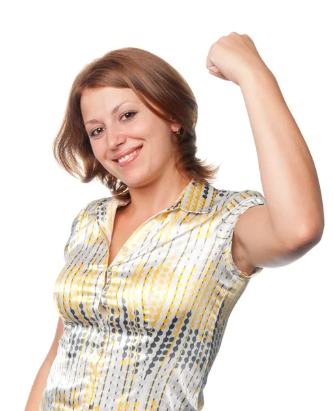 Smiling girl shakes the fist lifted upwards — Stock Photo, Image