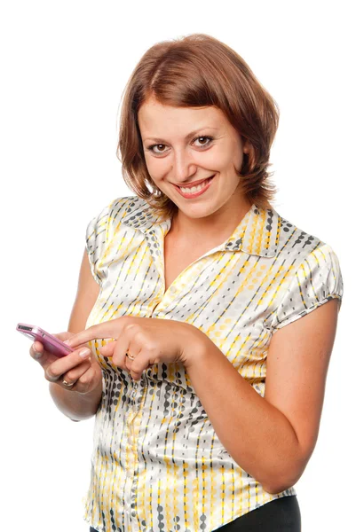 Smiling girl with a mobile phone — Stock Photo, Image