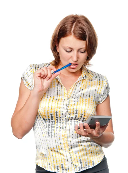 Thoughtful young businesswoman with pen and calculator — Stock Photo, Image