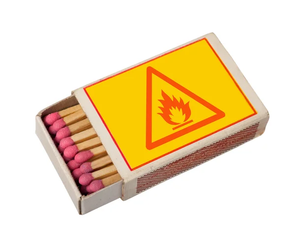 Matchbox isolated on white with hazard sign, clipping path. — Stock Photo, Image