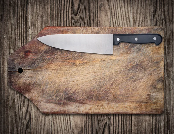 Kitchen knife on wooden table. — Stock Photo, Image