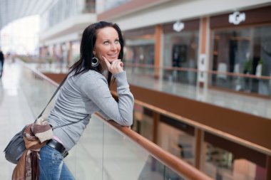 Sexy girl over mall background