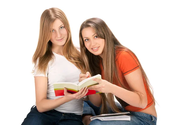 Due giovani studentessa felice, isolato su bianco — Foto Stock