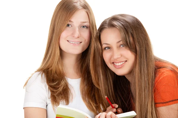 Két fiatal boldog diák lány, elszigetelt fehér — Stock Fotó